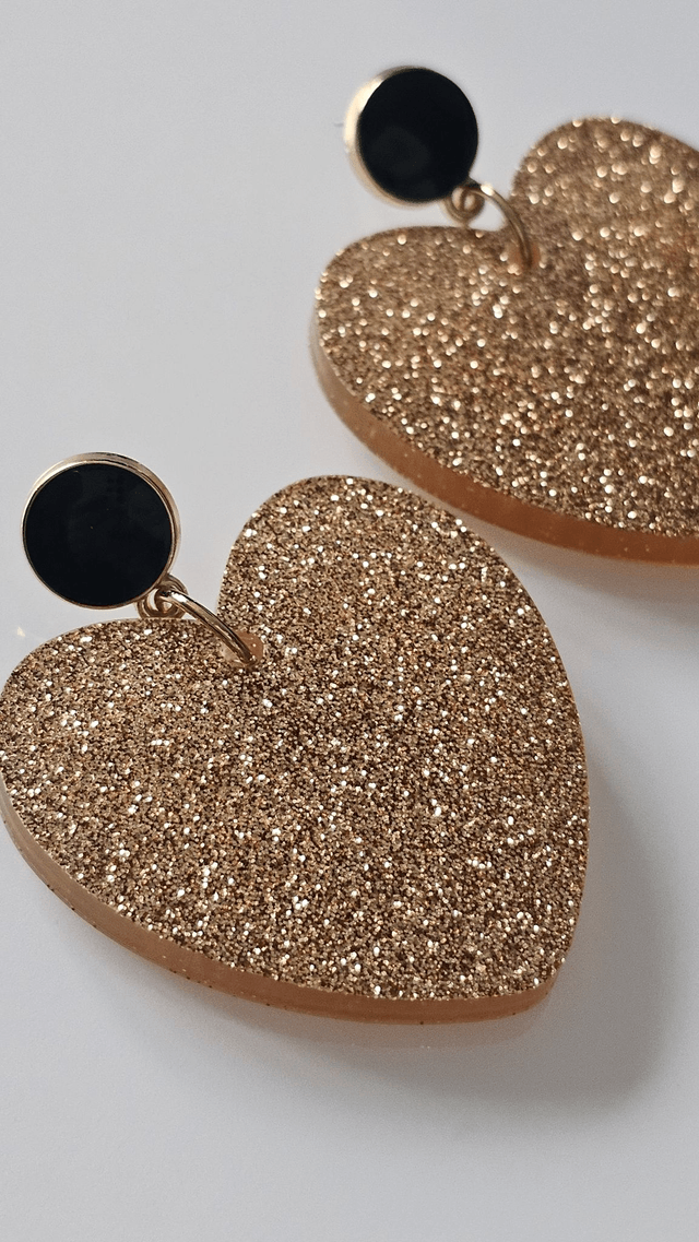 KISS'KISS aux apprêts noirs et fines paillettes dorées 