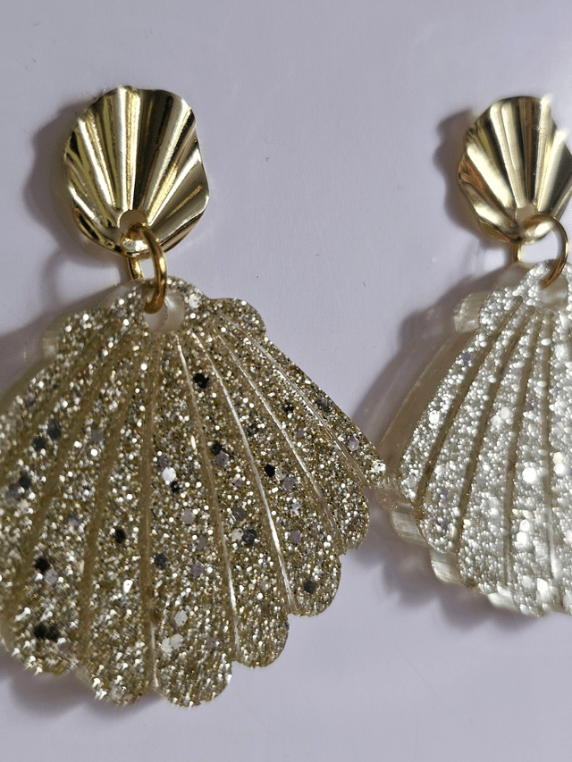 JACKIE aux fines paillettes or froid 